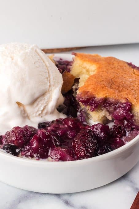 An easy fruit cobbler made of three berries.